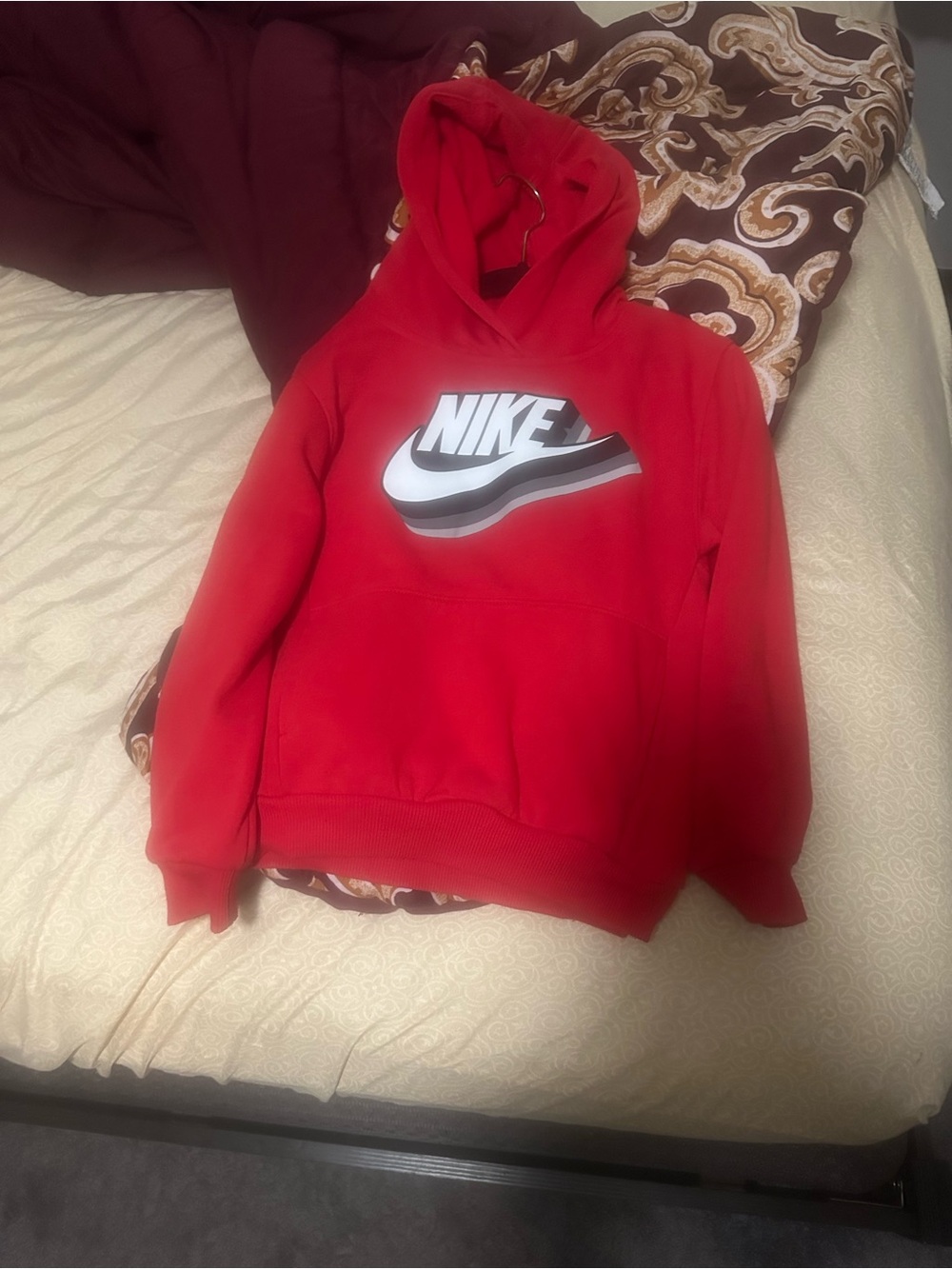 Nike Red Hoodie with White and Black Swoosh Graphic